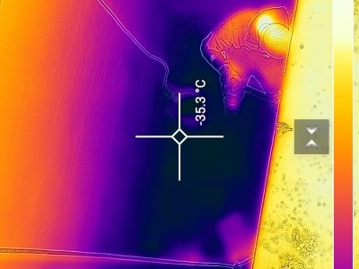 Thermal image of Tim McPhee and Martin 'Paddy' Loughlan in the cellar hole in the drill tent