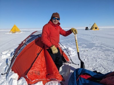 Alex Michaud putting up his tent