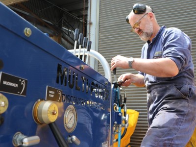 Darcy Mandeno working on the hot water drill