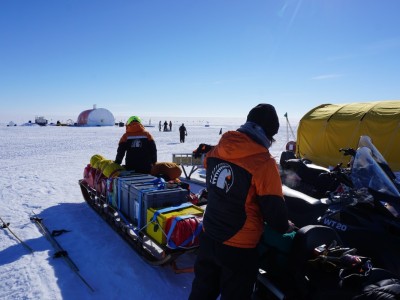 Working on equipment at Kamb Ice Sheet camp